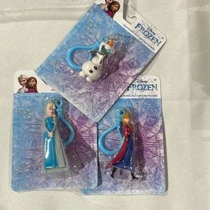 Disney’s Frozen Elsa, Anna, Olaf backpack, bag clip figurines. Set of 3